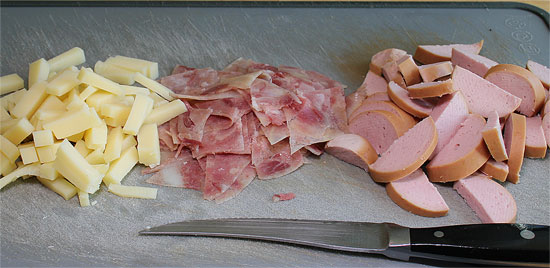 Cervelat, Käse und Ochsenmaul geschnitten